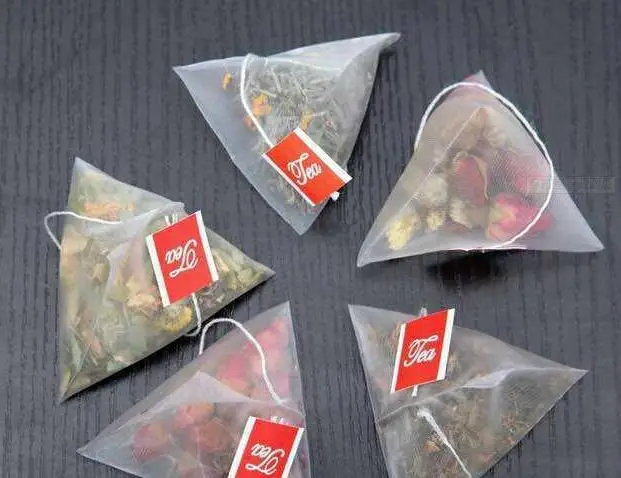 Most Popular Automatic Tea Bag Triangle Packaging Price Small Ultrasonic Tea Packing Machine with String