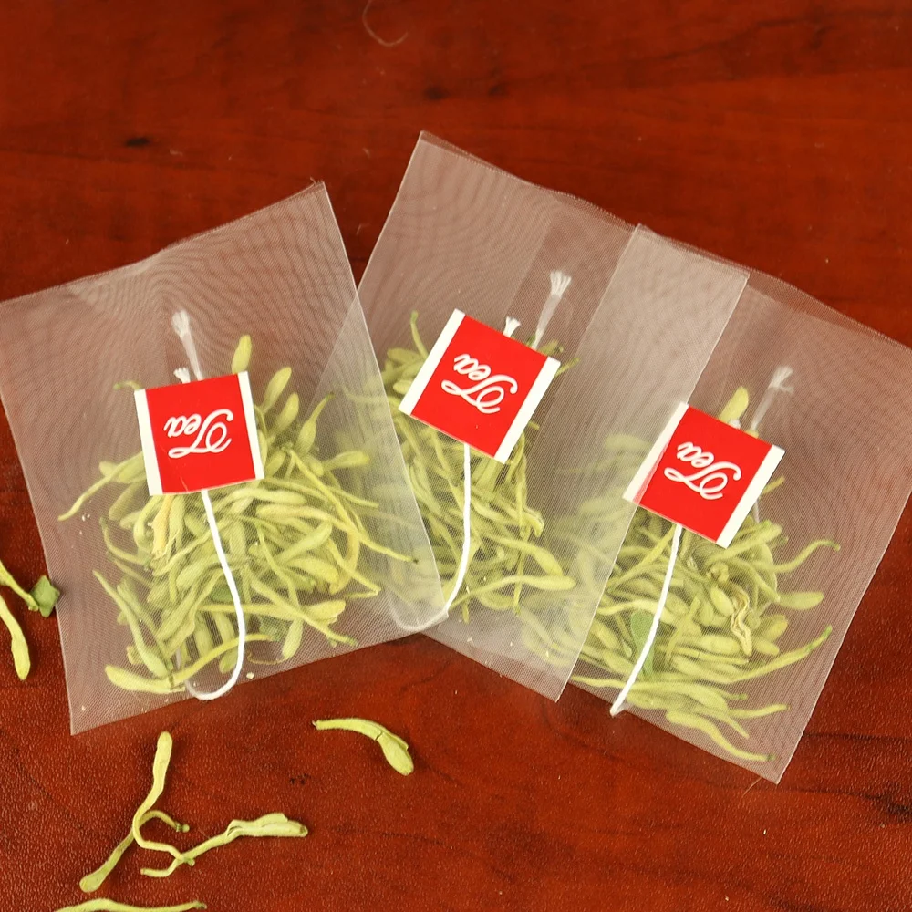 New arrivals nylon pyramid tea bag filter bags for tea flower packaging