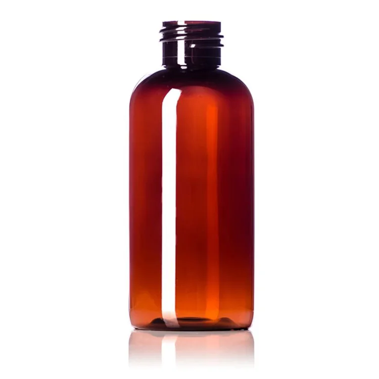 4 oz amber PET plastic boston round bottle with 24-410 neck finish