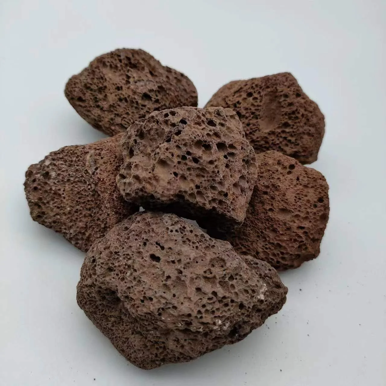 Large Red Volcanic Stone Supplier Factory Selling Volcanic Lava Rock Round Grinding Foot Stone Volcanic Rock Prices