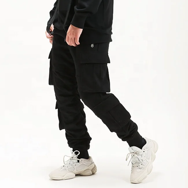 Stock usa street multi pockets zipper solid color pants elastic drawstring casual jogger pants mens popular sweatpants wholesale