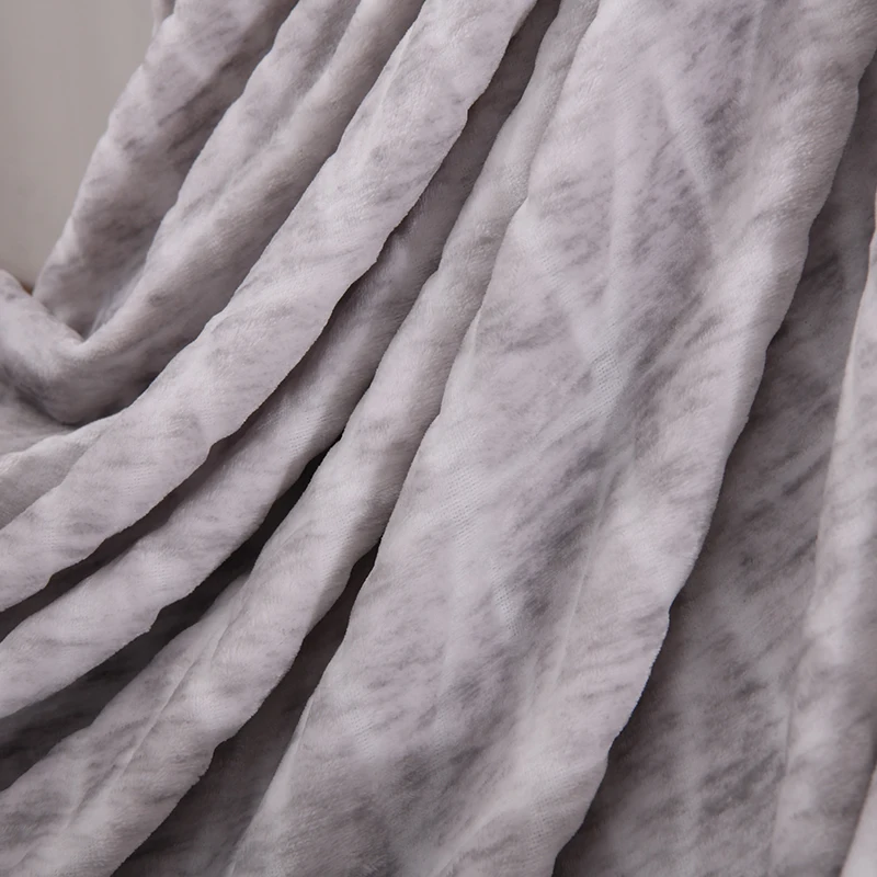 Flannel  throw/blanket  with  printed  and  carved  design