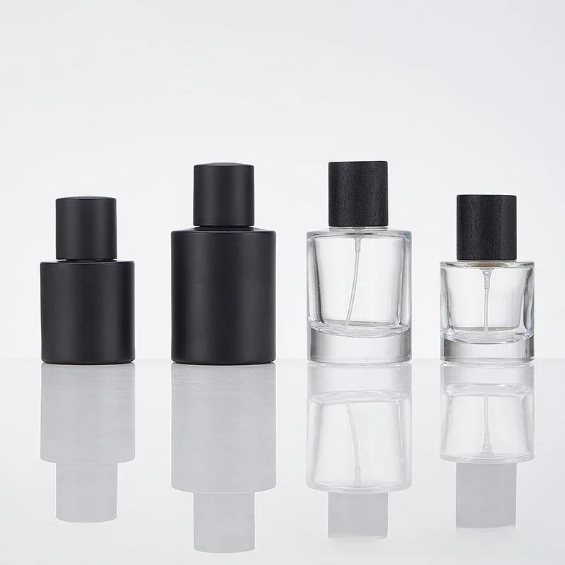 Wholesale Matte Black Glass Perfume Bottle 50ml Round Perfume Glass Bottle With Black Cap