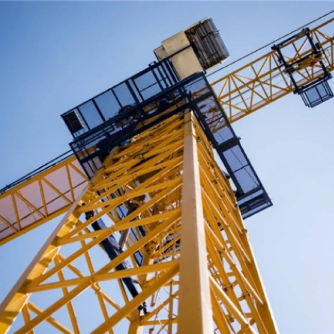 Self-Erecting Portable Building Crane 56 Meters Arm Length Self-Climbing Assembled Hammerhead Tower Crane With Embedded Legs