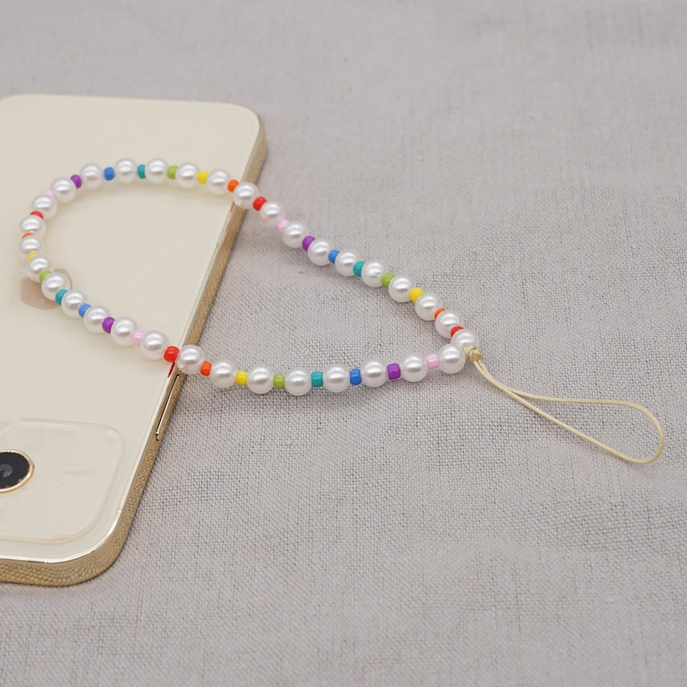 Dvacaman Модный корейский держатель для мобильного телефона с жемчужинами цветные бусины ремешок для телефона Очаровательная Ручная работа защита от потери на запястье на лето