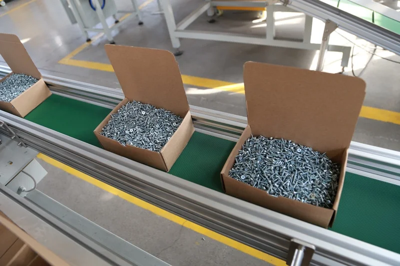 Full-automatic Screw Nuts and Bolts Hardware Carton Box Packing Machine by Shanghai Feiyu