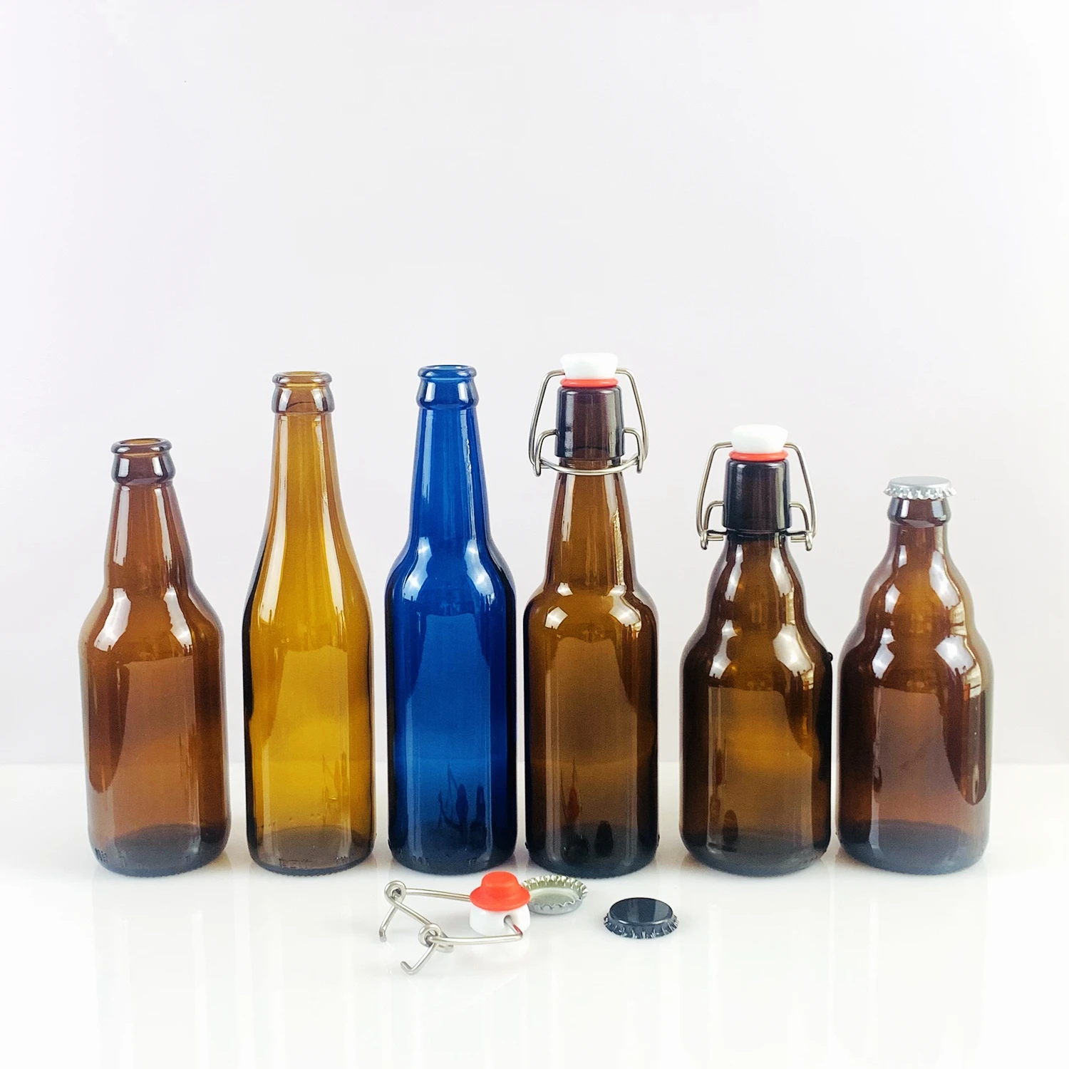 250ml 330ml 500ml Amber Clear Green Blue Color Glass Bottle With Crown Lid for Soda Water Beer Packaging
