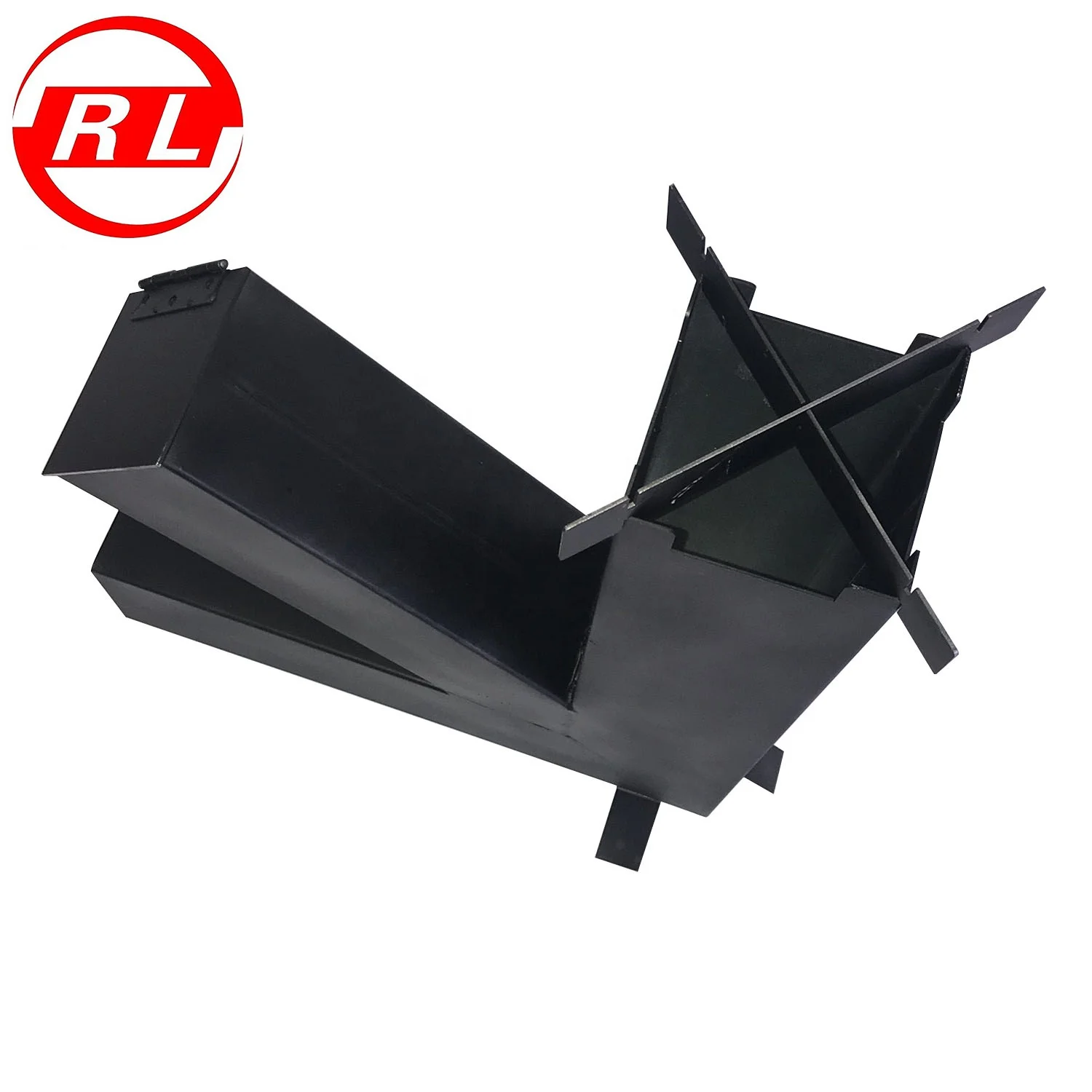 Stainless Steel Rocket Stove Loaded With Split Wood In The Vertical Chamber