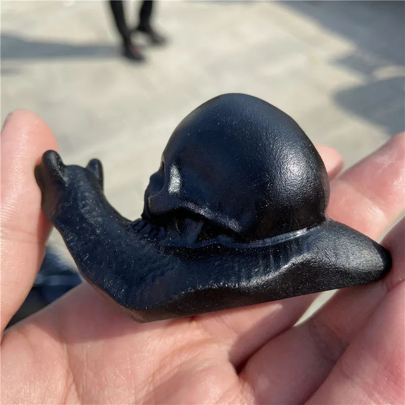 
Hot Sale Natural Healing Function Hand Carved Crystal Black Obsidian Snail Skulls For Home Decoration 