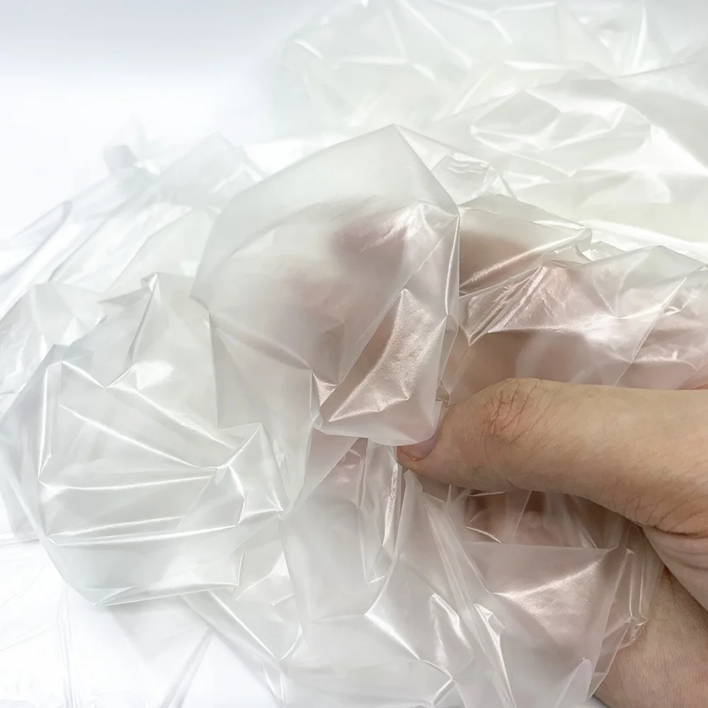 15 Microns Thickness Low Breathable White And Clear Laminated Polyurethane TPU Film For Wound Dressing