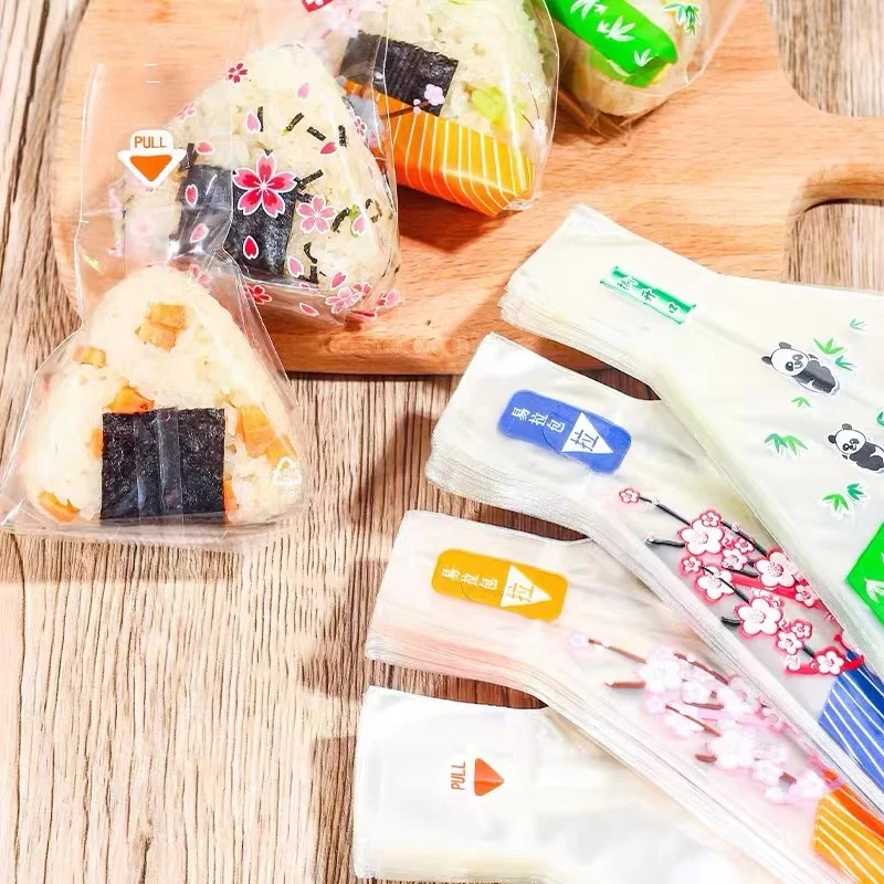 Безопасные пищевые пластиковые пакеты BOPP для onigiri треугольный рисовый шар пленочный пакет Бесплатная доставка в Россию