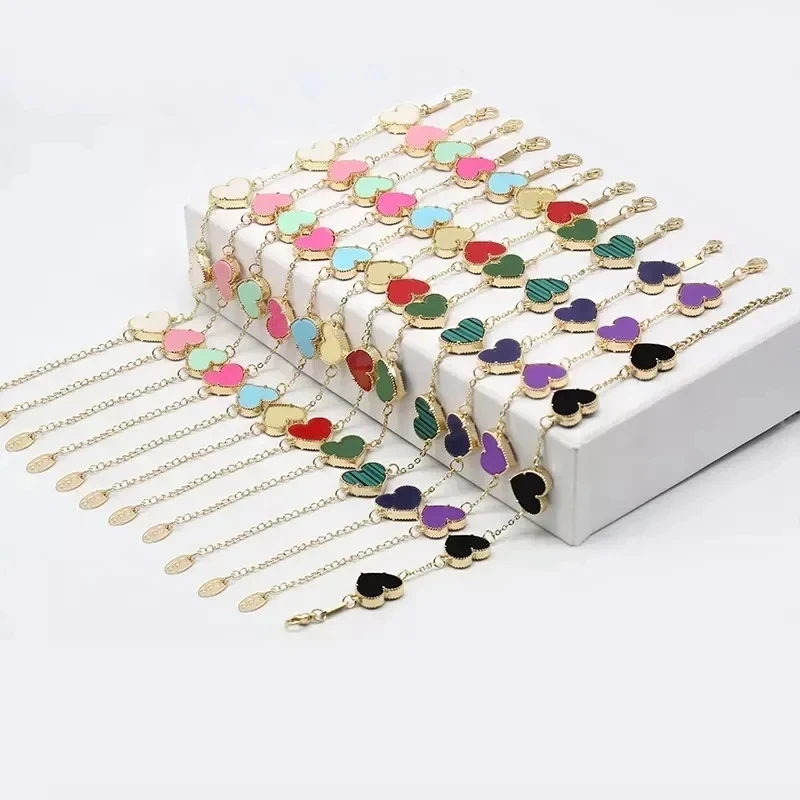 Stock gold plated double sided love heart shape bracelet jewelry adjustable acrylic leaf clover bracelet for women