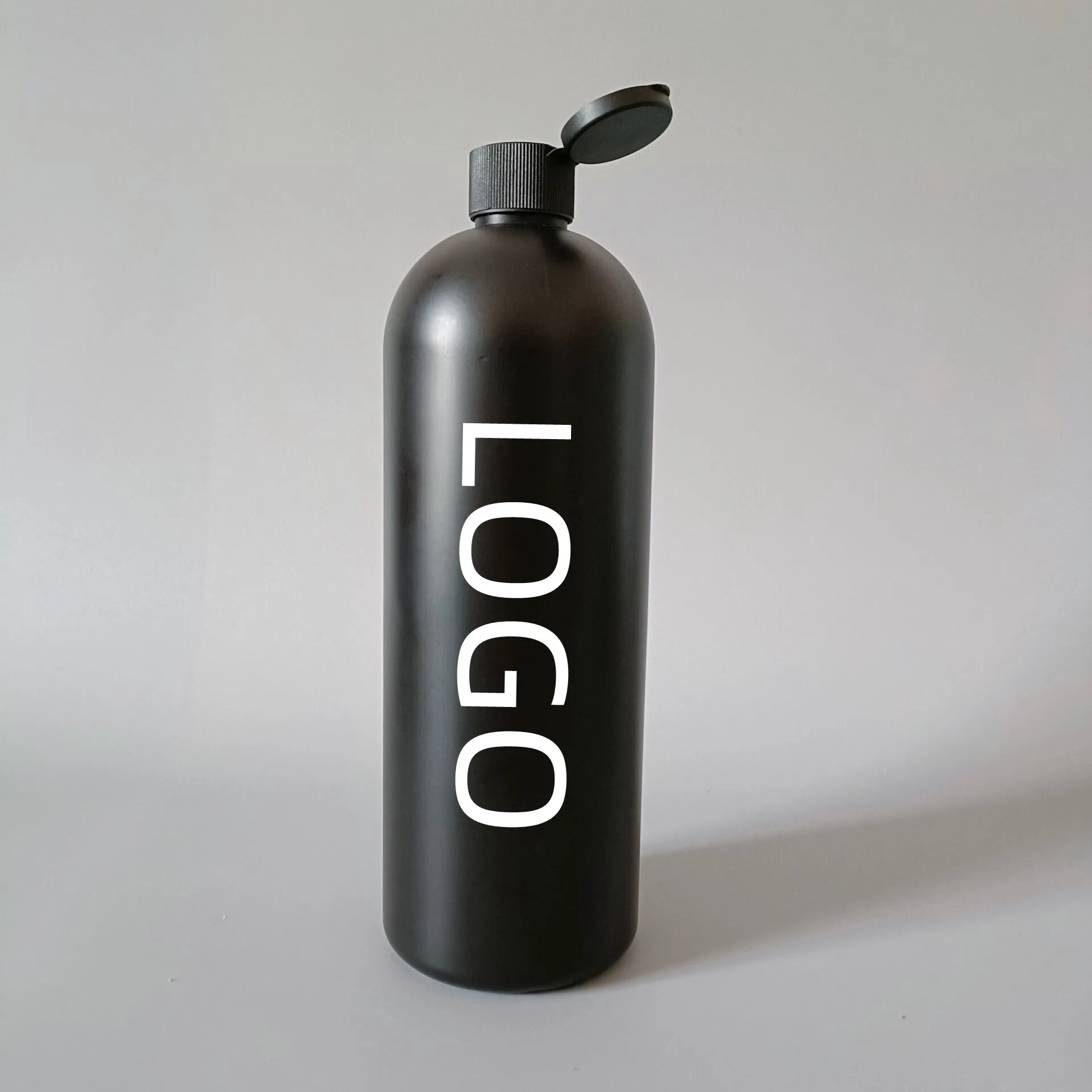32oz 1000ml 1L HDPE plastic round shape matt black cosmetic shampoo conditioner shower gel emulsion squeeze bottle with flip cap