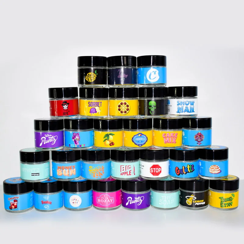 
Custom Design Food Clear Round Glass Jar For Weeds Herbs Skin Cream Bottle With Black Lid 2 Oz 