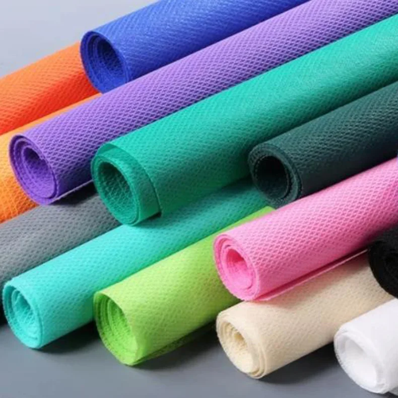 Wholesale High Quality Raw Material Polypropylene 100% PP Spunbond Non Woven Fabric Roll Colorful Nonwoven Fabric Manufacturer