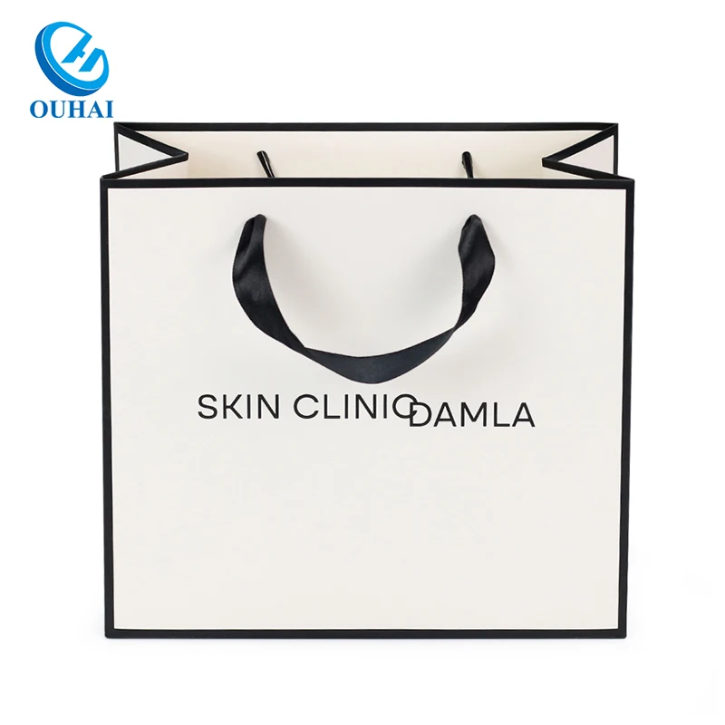 Wholesale Custom with Your Own Logo Lamination Cardboard Grey Board Paper Bag with Ribbon Handle for Shopping Retail Packing