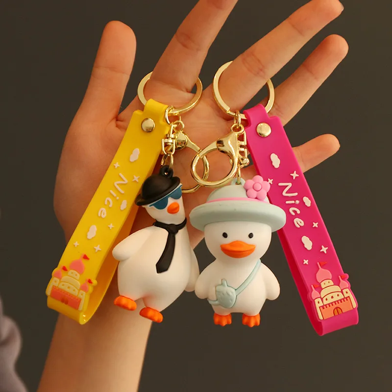 High Quality Wholesale Cute Cartoon Duck Chick Silicone Keychains Creative Student School Bag Pendant Gift Coin Purse Keychain