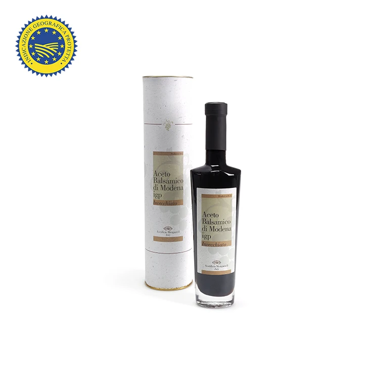 
Aged Balsamic vinegar of Modena PGI in White Tube, made in Italy in exclusive packaged by hand packaging 