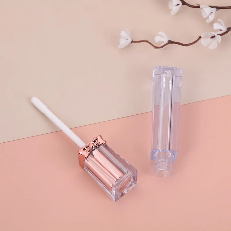 CCG-091 Custom Logo Unique Design Wholesale High Grade Fancy Pink Bow Lip Gloss Tube Empty Plastic Cosmetic Lipstick Tube