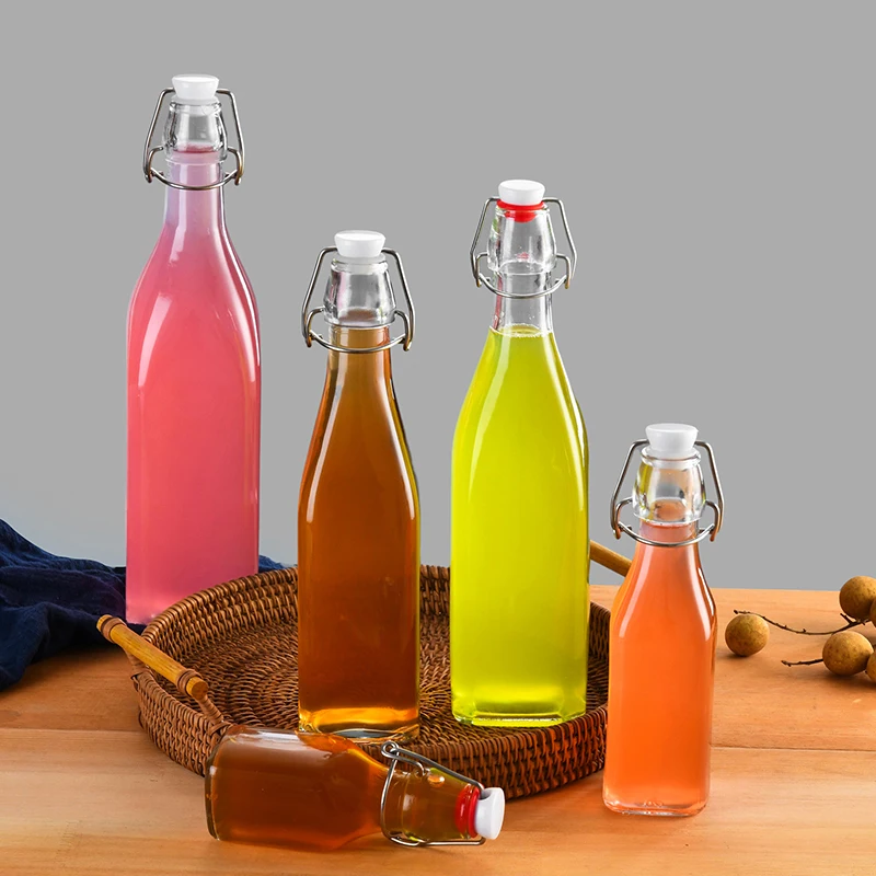 Glass bottle factory 250ml 500ml 750ml 1000ml empty transparent swing top glass liquor Swing Top Glass Bottles