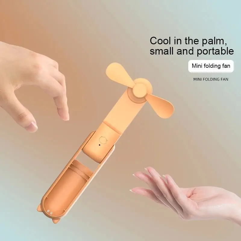 New hand-held mini fan foldable portable outdoor office noise reduction fan with USB charging bank