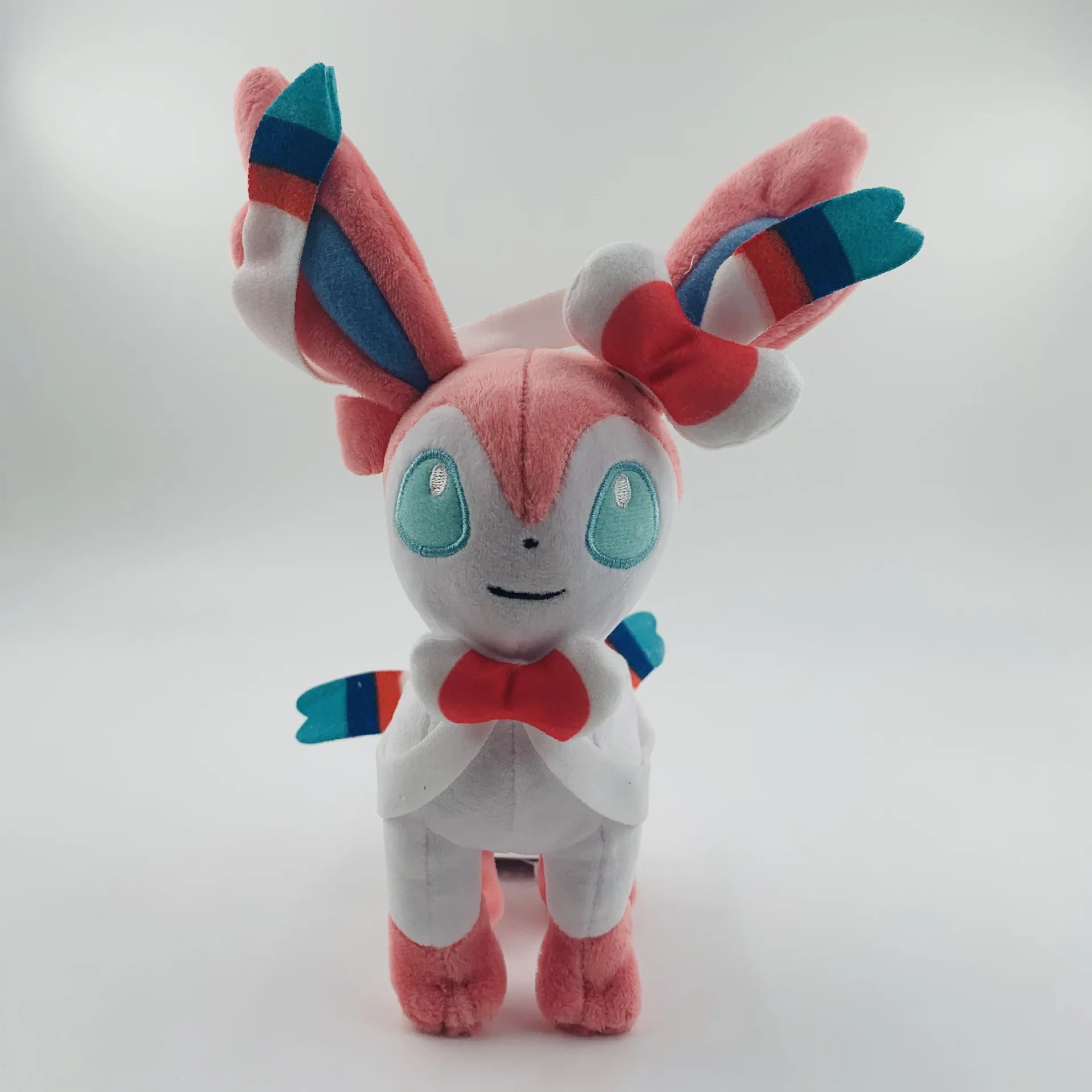 Wholesale 20cm High Quality Anime Poke mon Plush Toy With Tags Standing Evolution Eevee Plush Grab Doll