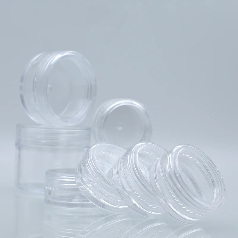 Wholesale small 15gram 10g 15g 10ml 2.5ml 3 ml 5ml transparent wax plastic cream jar oil empty tester jar with lid 3ml container