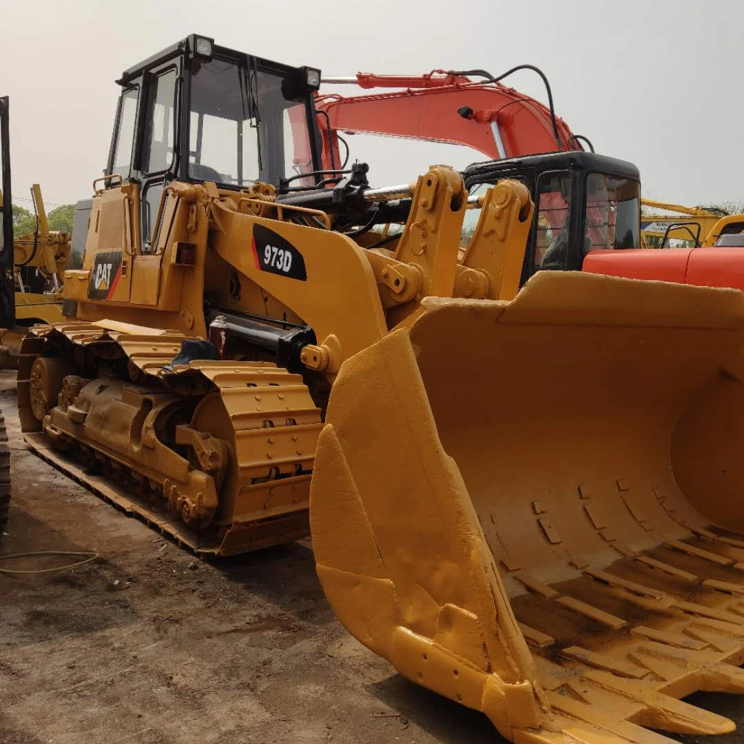Б/у строительная техника колесный погрузчик cat 973d по