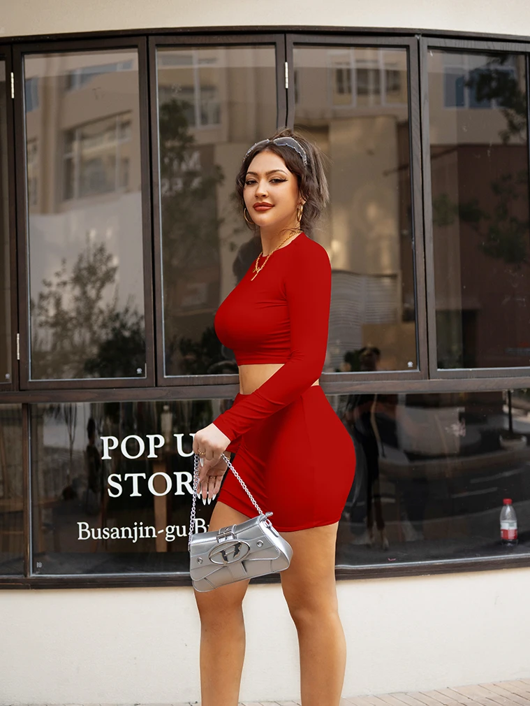 Wholesale fashion winter tight long sleeve crop top and solid mini skirt 2 piece set women