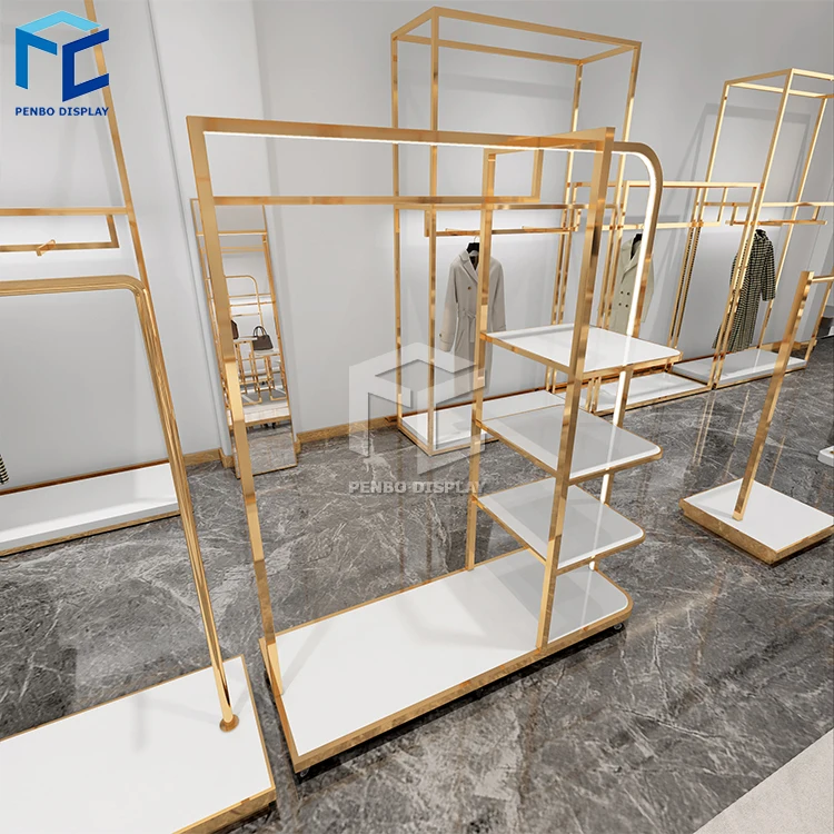 Gold clothing rack apparel retail nesting table clothes shelving garment display rack clothing store furniture