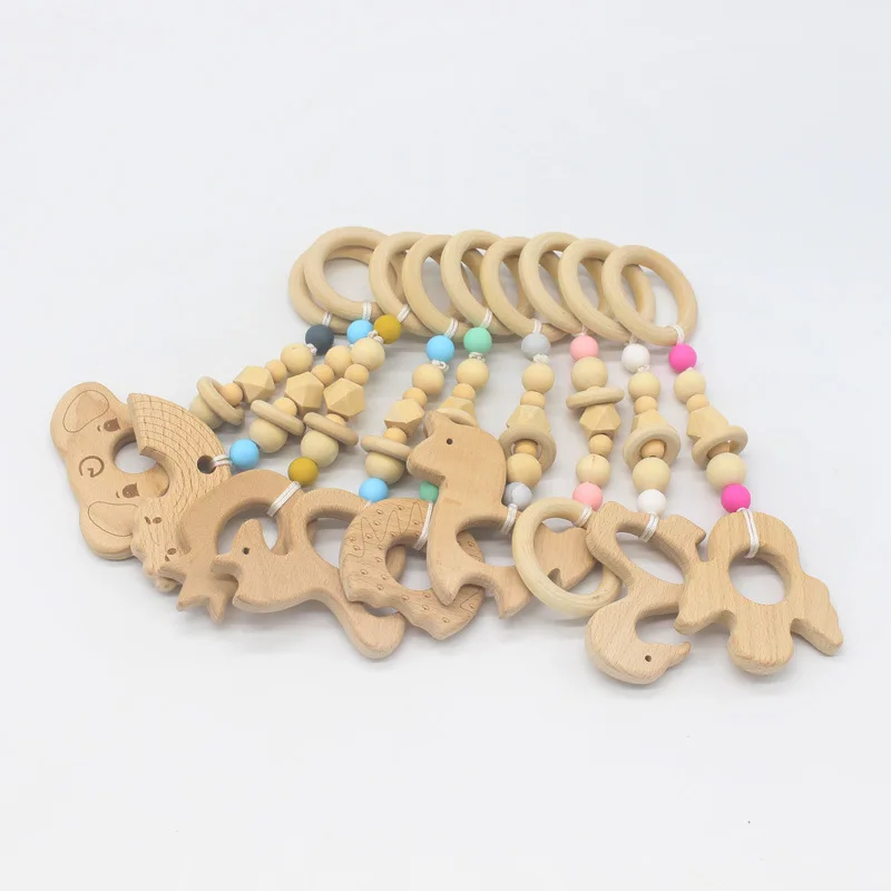 
New Design Beech Wooden Animal Bulk Baby Teething Toy Teether Wood Beads Teether Rattle Ring Baby Gym Toys 