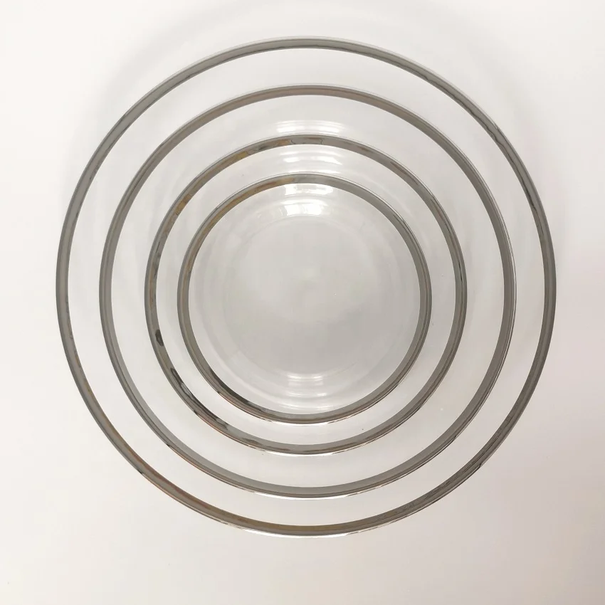 Good quality stocked round clear glass dinnerware sets with silver rim transparent glass charger plate set