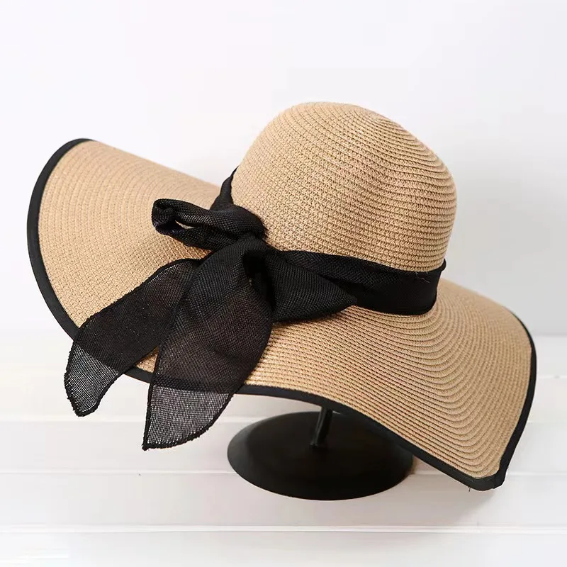 2022Summer new straw hat bowknot sunshade big hat along the ladies beach sunshade big straw hat manufacturers wholesale