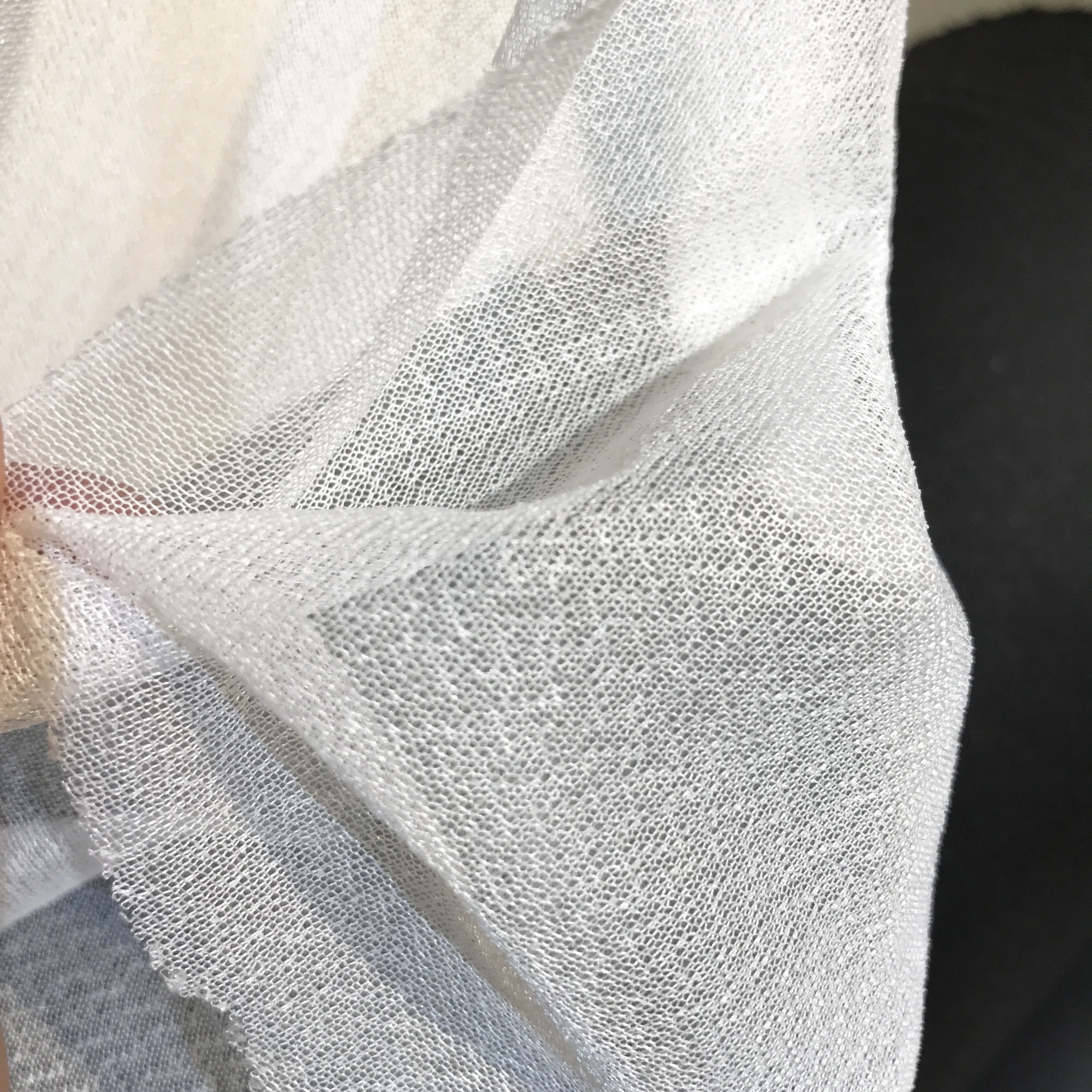 Circular elastic fusible knitted interlining fabric for garment backing