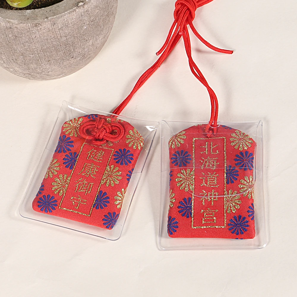 A Red Omamori Charm Japanese Amulet Lucky Omamori  from Hokkaido Jingu for Health