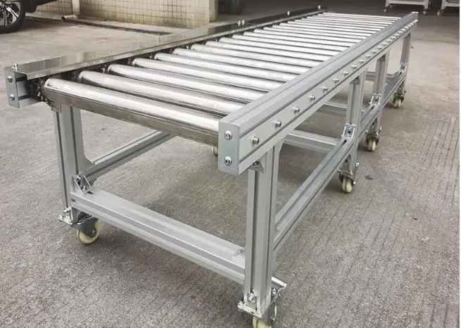 Automatic slide unloading stainless steel power transfer table roller conveyor