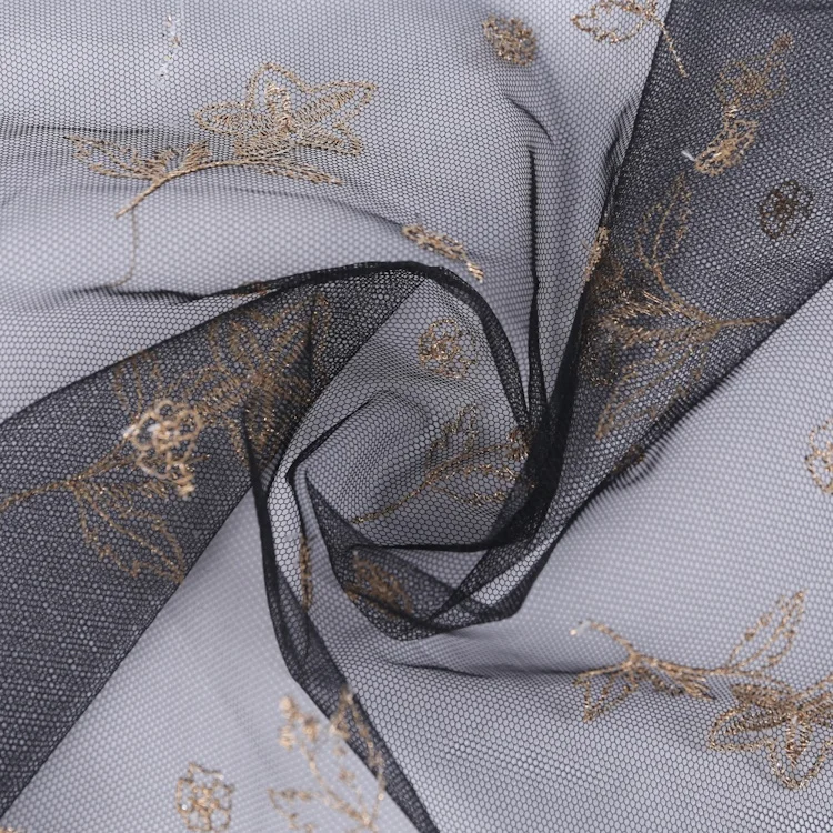 Mesh embroidery fabric with all over embroidery metallic yarn