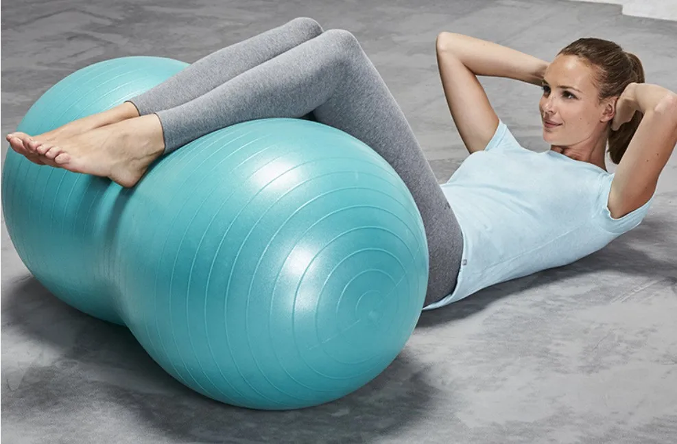 YangFit eco-friendly custom balance oval gym pvc peanut anti-burst yoga ball 45X90cm for fitness exercise