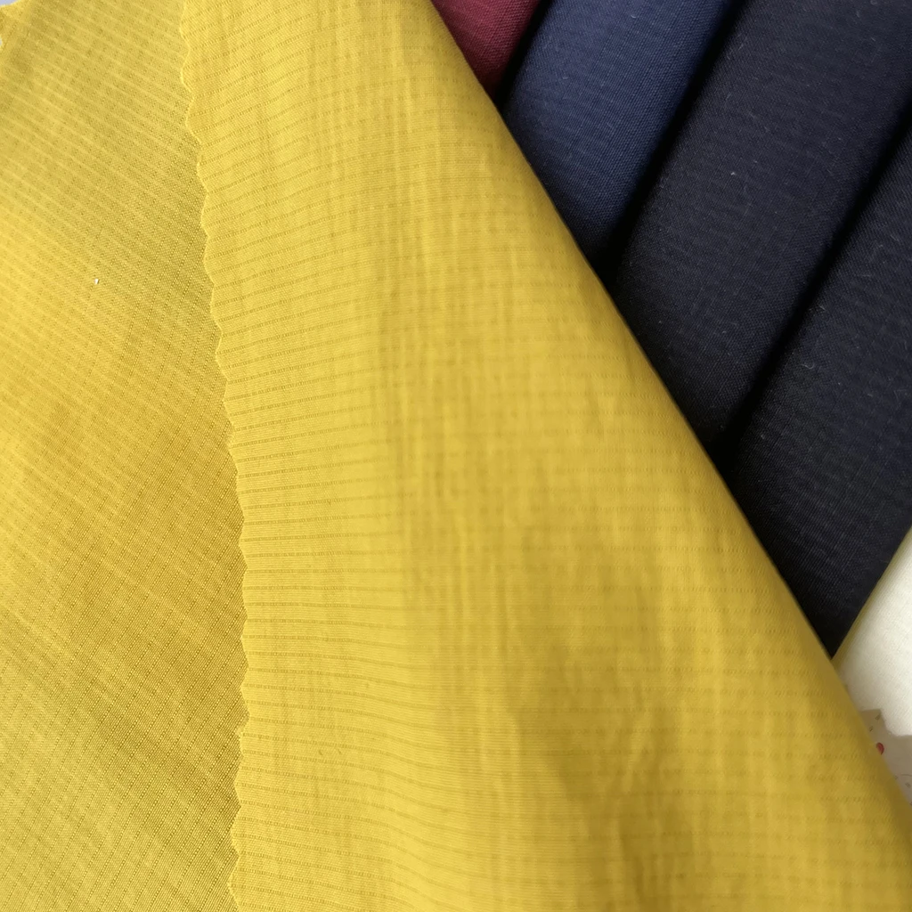 wholesale wrinkle 100% nylon 40D waxing checking ripstop fabric waterproof PU glue coating down jacket windproof fabric for coat