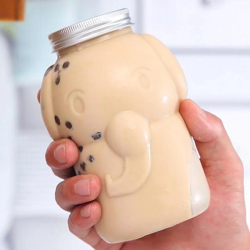 Hot sale 500ml elephant shaped bottle PET  animal shaped plastic beverage bottle beverage bottle packaging with top aluminum cap