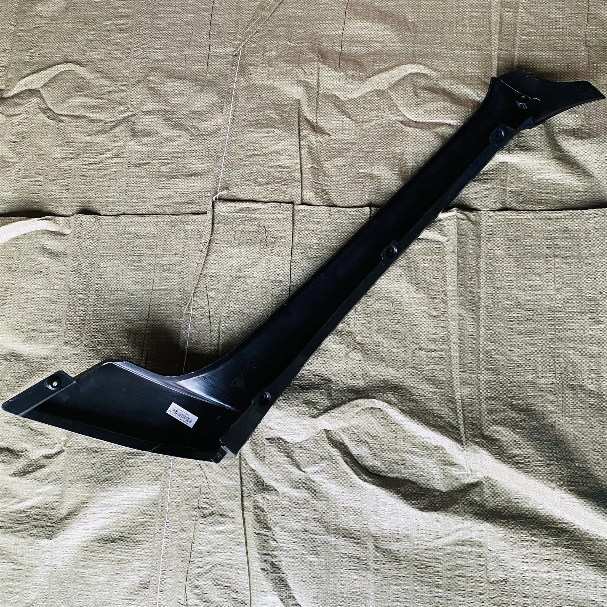 Cost-effective sinotruk howo truck spare partsWG1671110120 A column glass decorative panel a-pillar trim panel