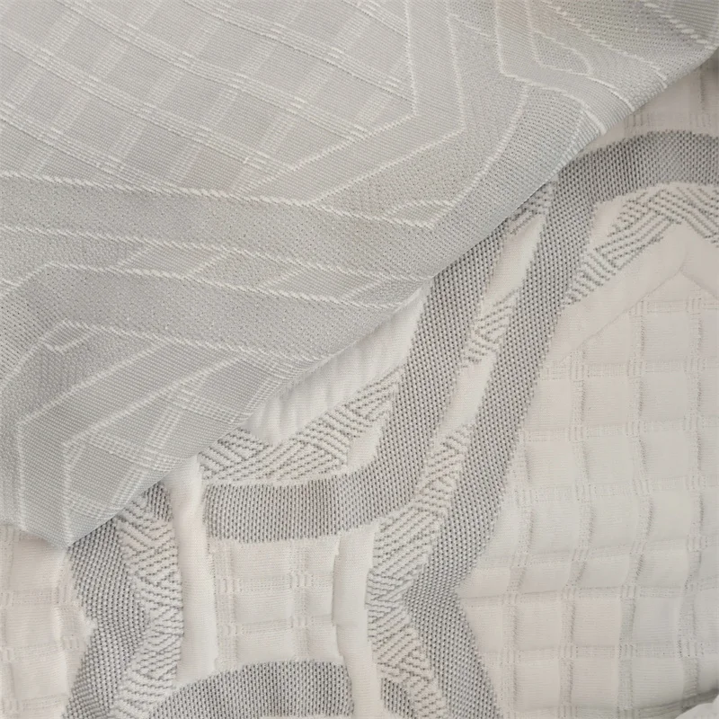 Light and thin vortex spinning technology home textile fabric yarn dyed jacquard knitted mattress fabric