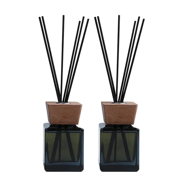 Vietnam Wholesale 100ml Perfume Oil Reed Sticks Empty Glass Diffuser Bottles With Wood Caps