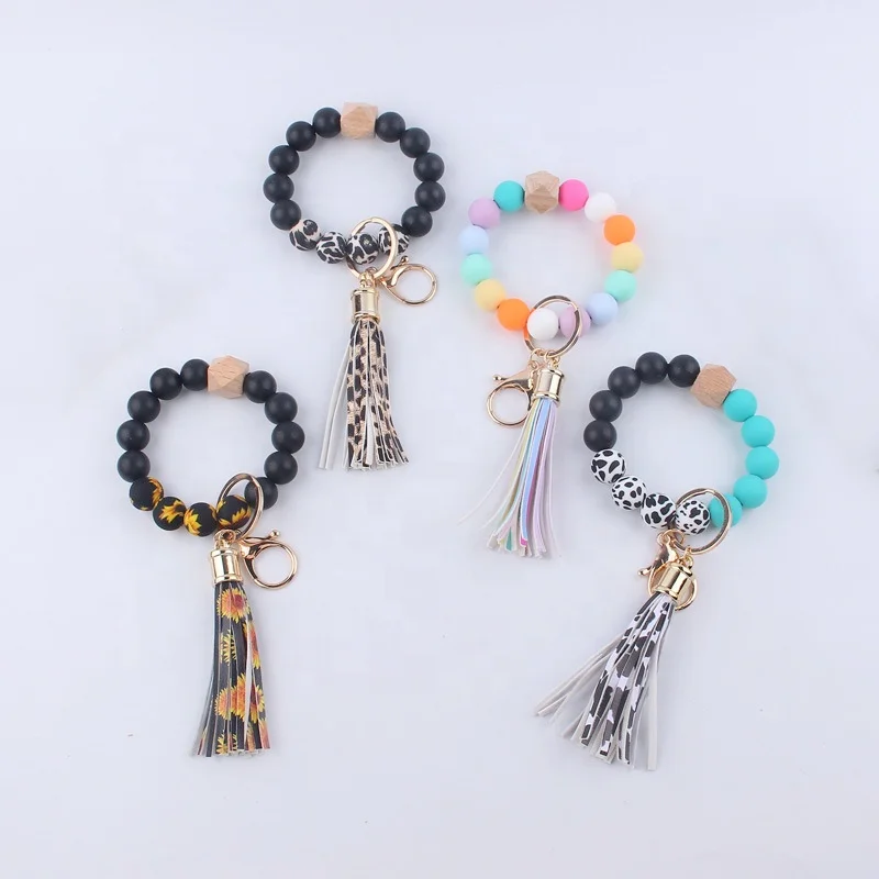 Hot Sale Colorful Bright House Car Keys Holders Portable Silicone Beaded Bracelets Key Chain with Leather Tassel
