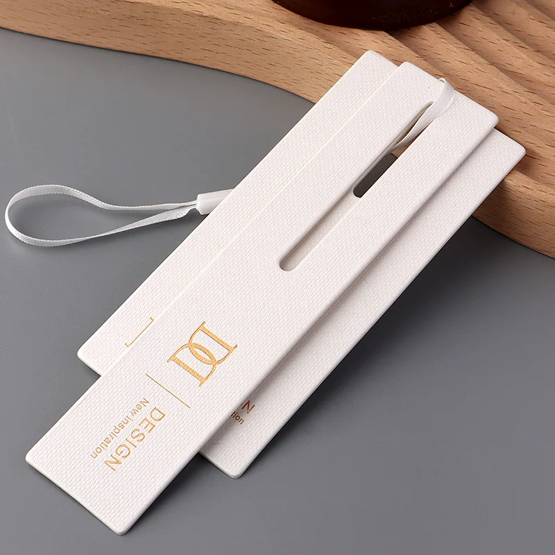 Custom Printing Brand Name Logo Clothing Out Swing Garment Labels Die Cut Hang Tag Embossed Paper Hangtags