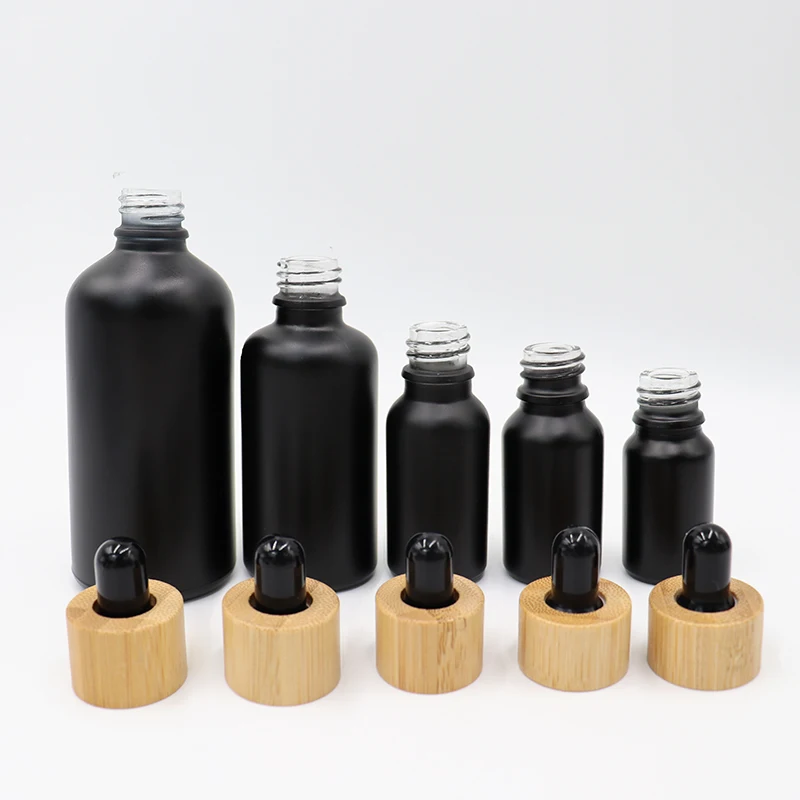 High Quality Dropper Bottle Empty Essential Oil for Face Skincare Black Amber Frosted Glass Dropper Bottle with Bamboo lid