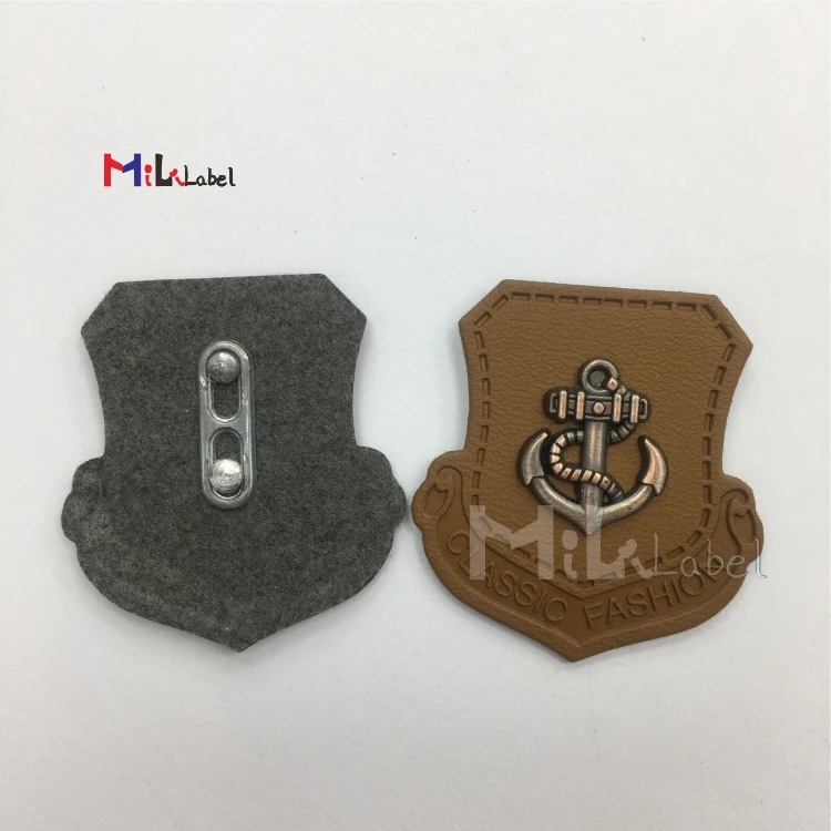 
Wholesale Custom leather patches hat metal tags leather tag iron-on metal logo metal badges iron on for hat bags shoes 