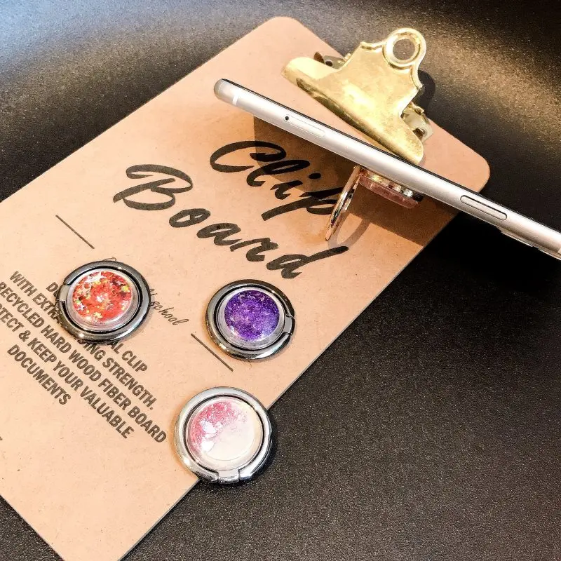 
2019 New Arrival Gadget Mobile Accessories Finger Ring Holder Phone Stand Drift Sand Quicksand Design Christmas Gift 