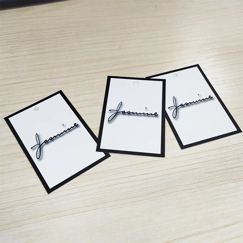 
 Высокое качество, простые 7*4 см, сделанные на заказ белые бумажные бирки для одежды  