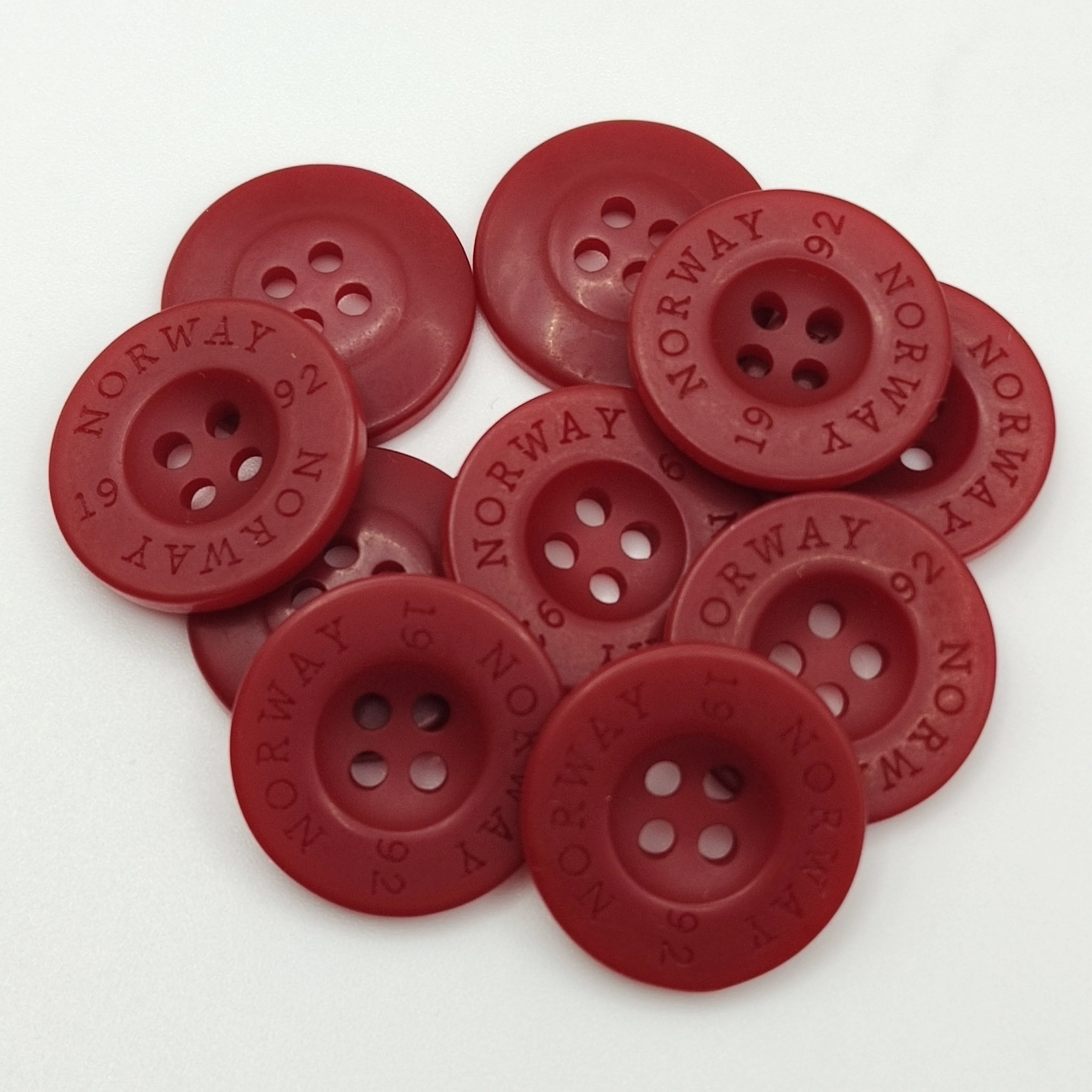 China Custom Colored  Red  bFlat 4 Holes Round Polyester Resin Big Size garment Buttons